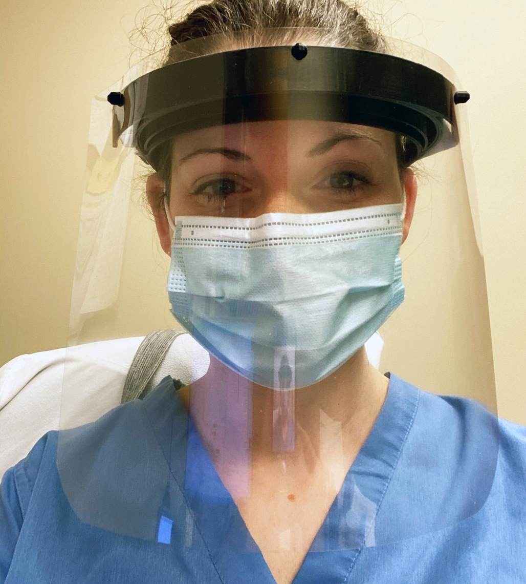 Dr. Beverly wearing a face shield on the job in June 2020